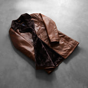 Styled Fit Perspective of Men's Cinnamon Distressed Leather Fur 가죽 롱 코트 남성용 on Model - Natural Daylight Drape