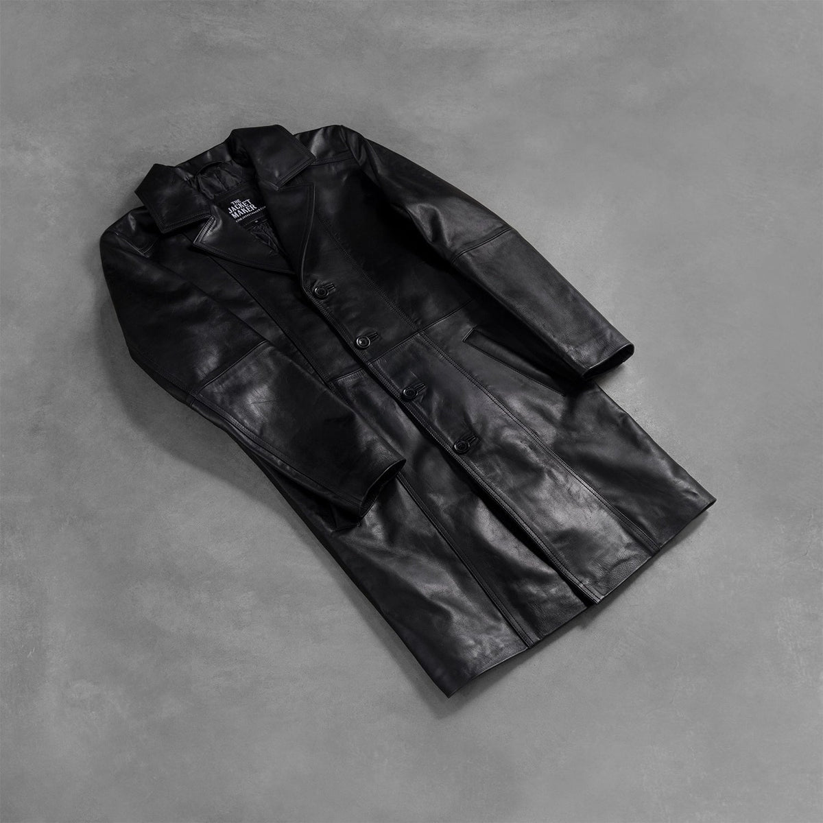 Open hem &amp; Hem Craftsmanship Construction Detail on Men's Don Long 블랙 가죽 롱 코트 남성용