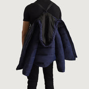 Close-Up Detail of Classic Collar &amp; Zipper With Wind Flap Hardware on Erico Blue Hooded Puffer 가죽 자켓 남성용