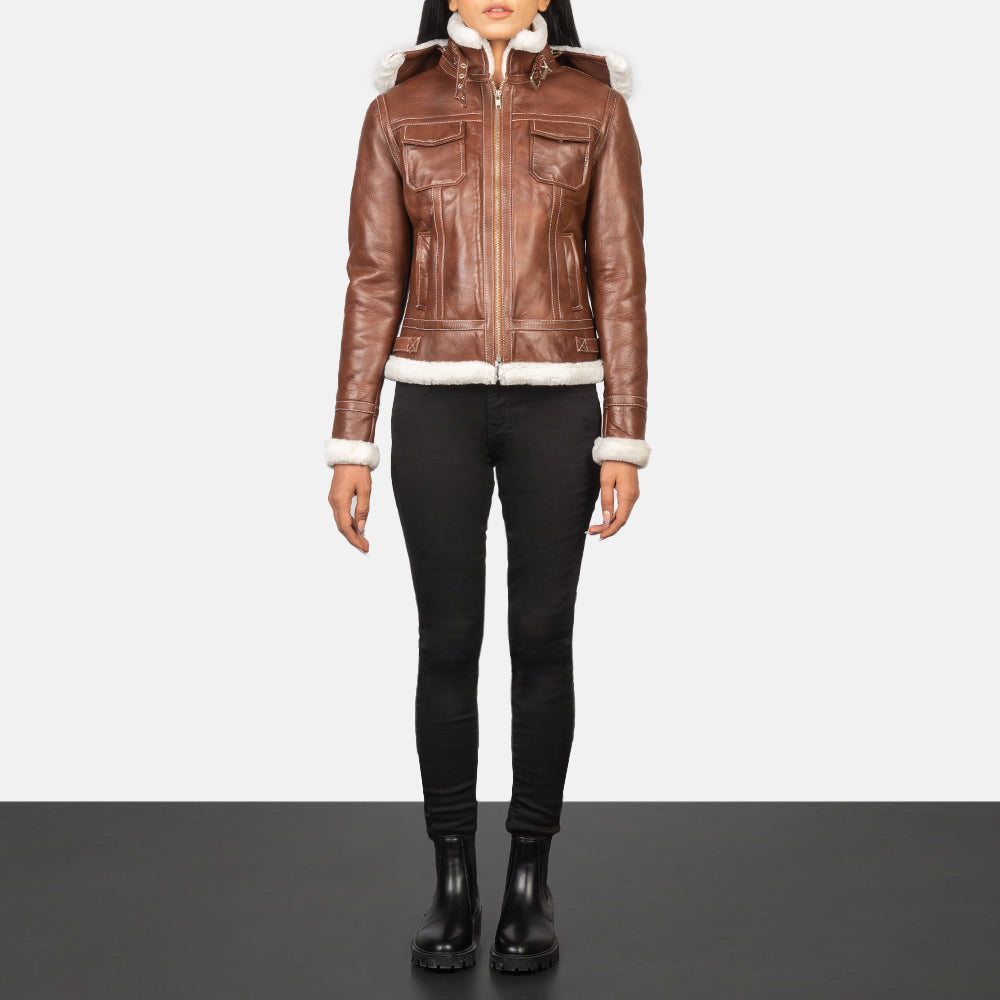 
Fiona Brown Hooded Shearling Leather Jacket - 입체 소매 커팅과 슬림 테이퍼드 핏을 보여주는 측면 뷰