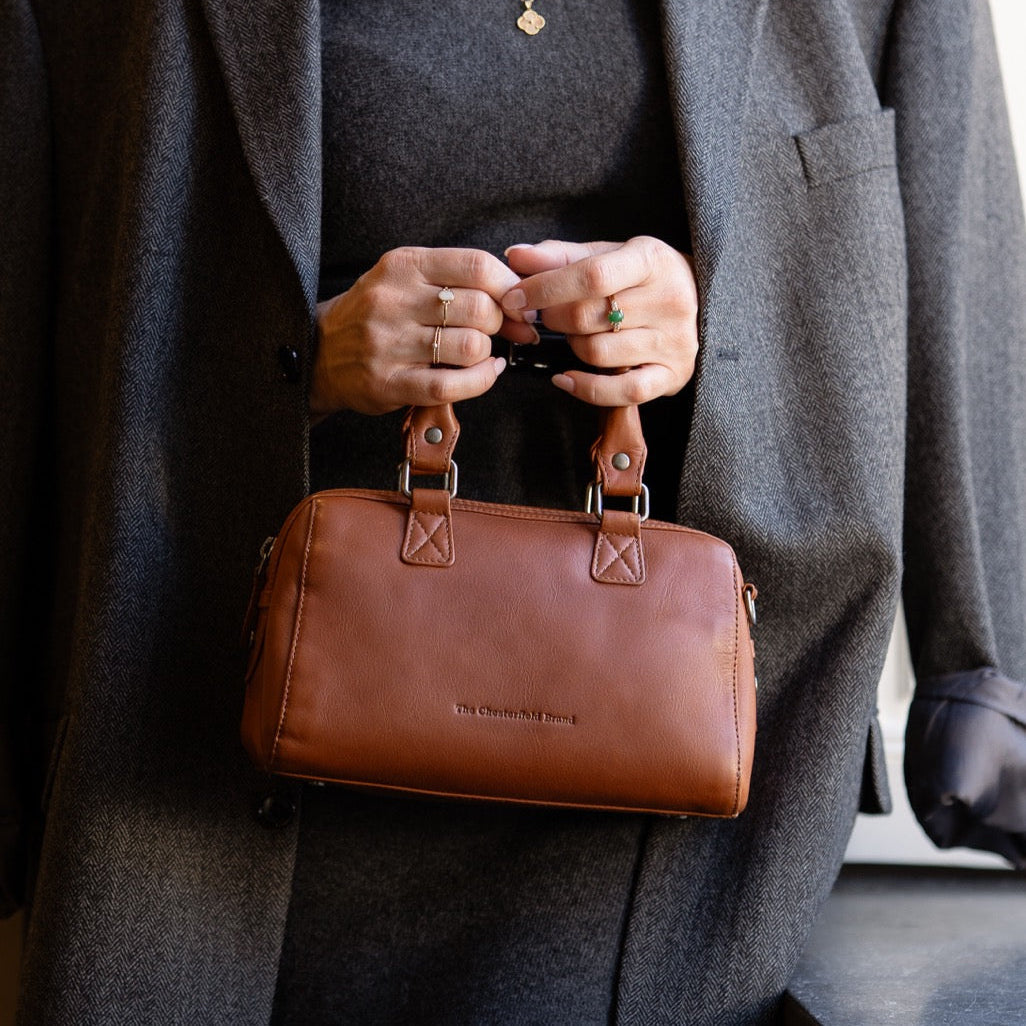 Styled Fit Perspective of Dalford Full-Grain Leather Handbag 여성용 on Model - Natural Daylight Drape