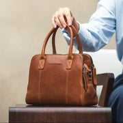 Styled Fit Perspective of Ezra Full-Grain Leather Handbag 여성용 on Model - Natural Daylight Drape