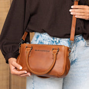 Styled Fit Perspective of Fenja Full-Grain Leather Handbag 여성용 on Model - Natural Daylight Drape