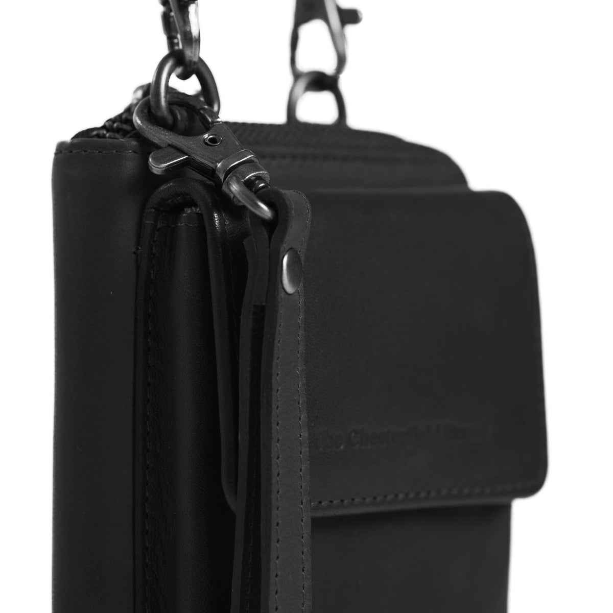 
클로즈업 상세 of Classic Collar & Heavy-Duty Zipper Hardware on Malaga 풀그레인 천연 가죽 Phone Bag