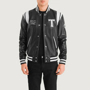 
Liberte Texas 블랙 Leather Varsity 가죽 자켓 남성용 in Black & White Sheepskin Leather - 정면 스타일 및 테일러드 실루엣 | 공식 온라인 스토어 구매