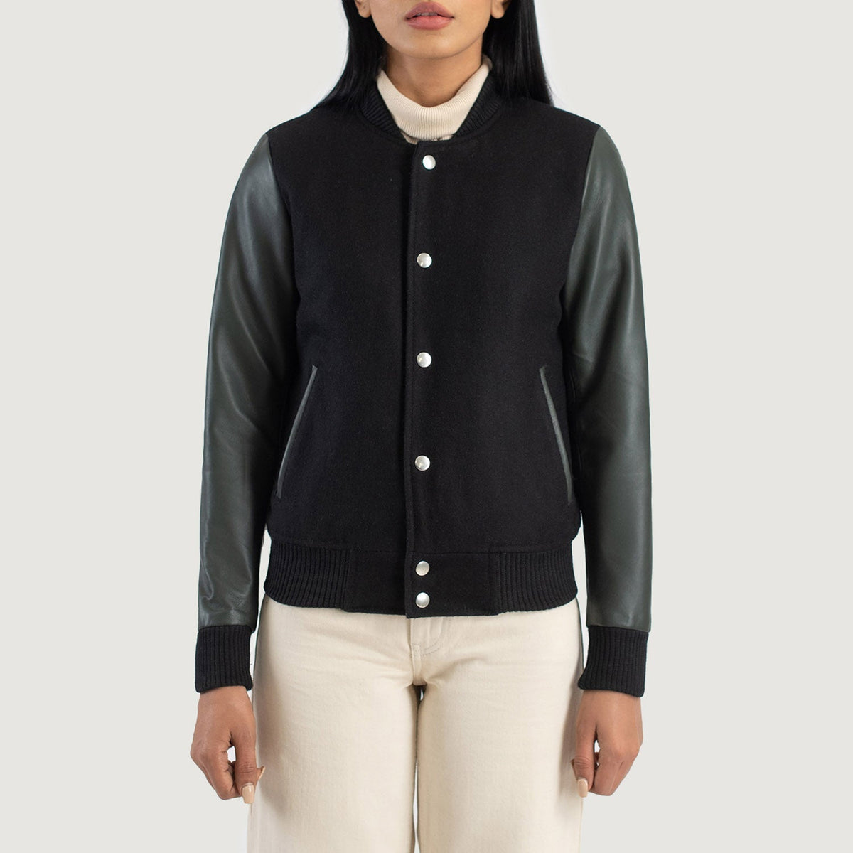 
클로즈업 상세 of Varsity & Snap Buttons Hardware on Savant Green Hybrid Varsity Jacket