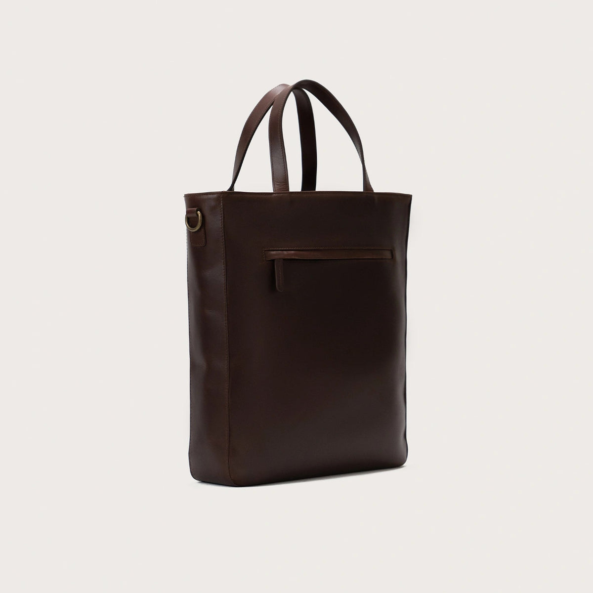 
The Poet Vintage Brown Leather Tote Bag For Men & Women - 수납 깊이와 확장 용량을 보여주는 측면 뷰